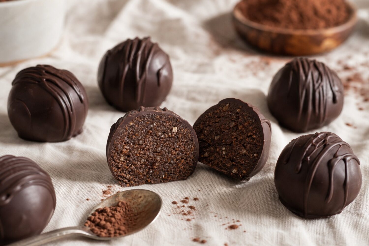 Dark chocolate protein truffles, one cut in half